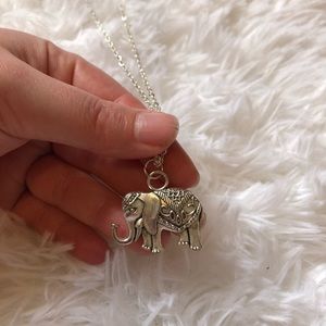 Long silver chain elephant pendant